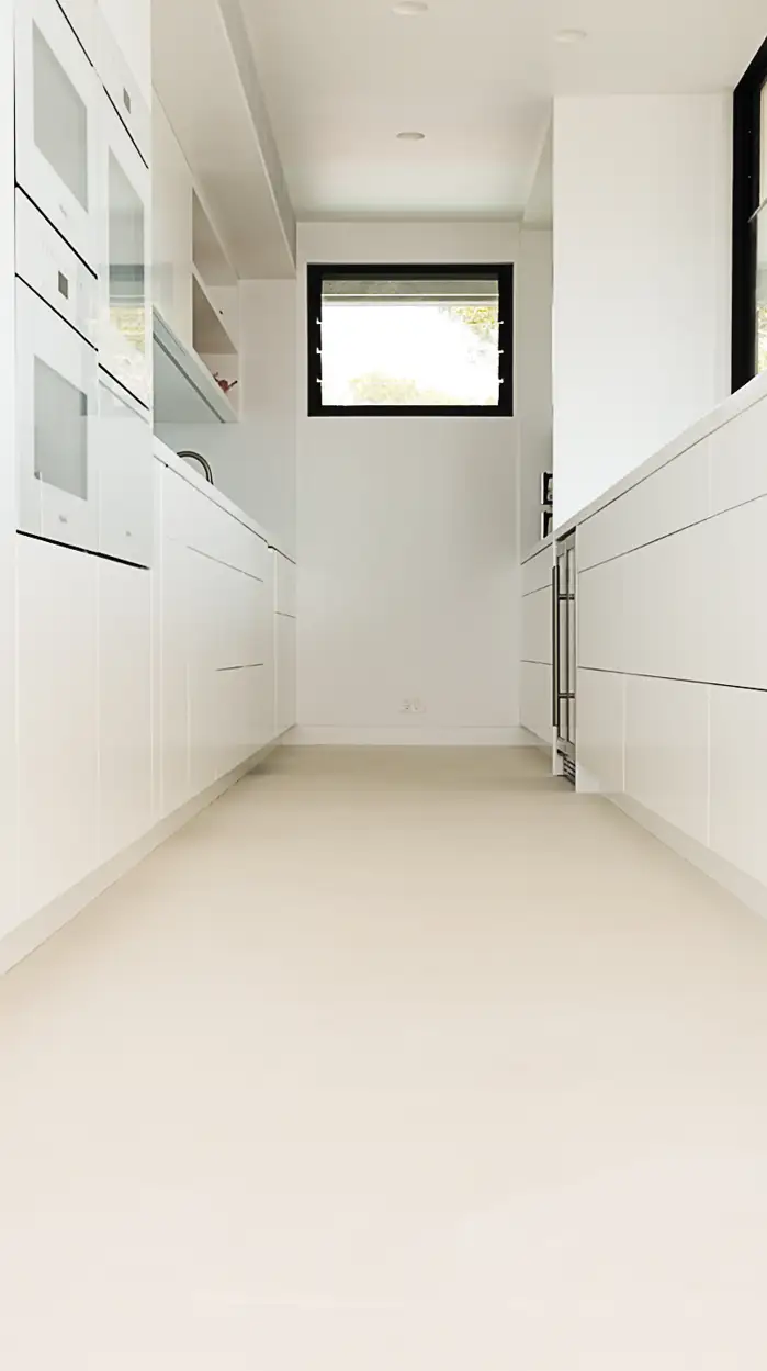 Soft, matte microcement floor in a calm Avalon interior