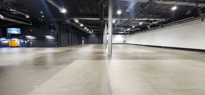 Grind-and-seal concrete floor in a utility-style space