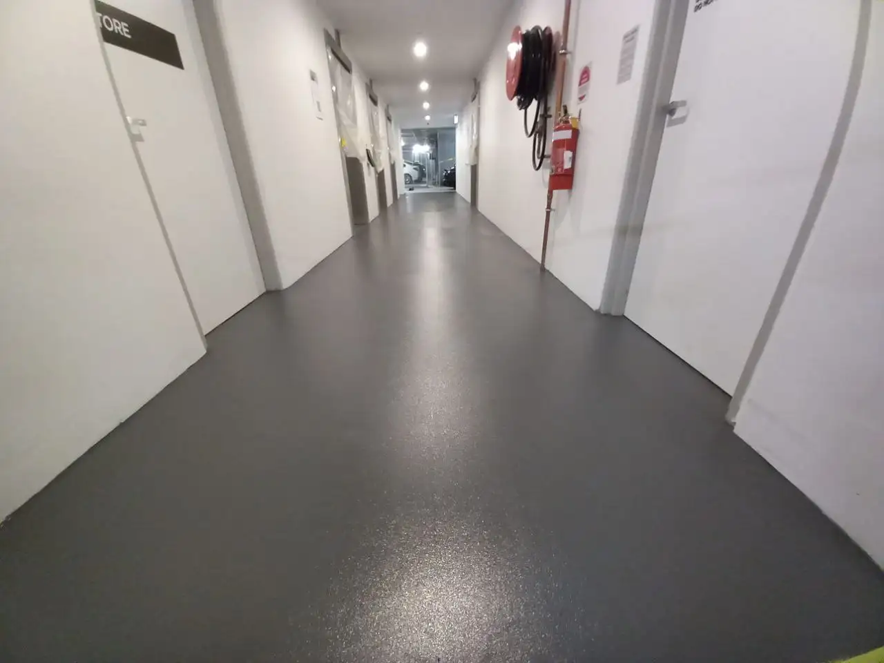 Completed epoxy flooring at lift area, Landmark St Leonards