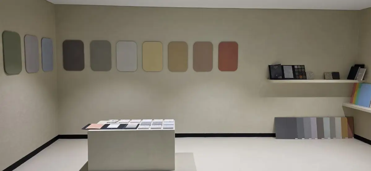 Microcement and stone finish sample boards on display at the Nextone Lane Cove West showroom