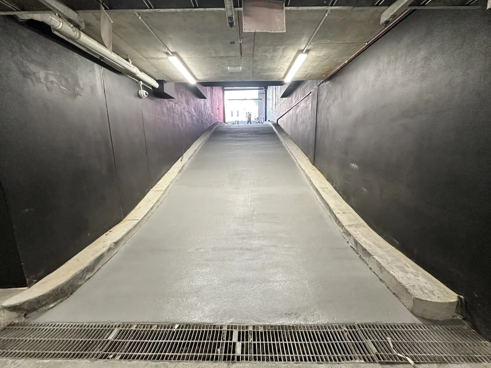 Completed steep ramp — MMA/PMMA finish ready for return to service